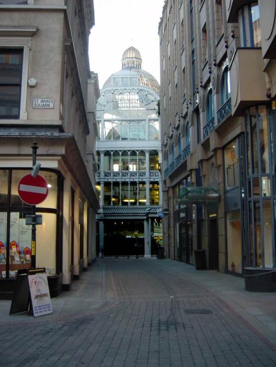 a street with a glass dome on the top