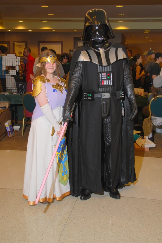 a man and woman dressed up as star wars characters