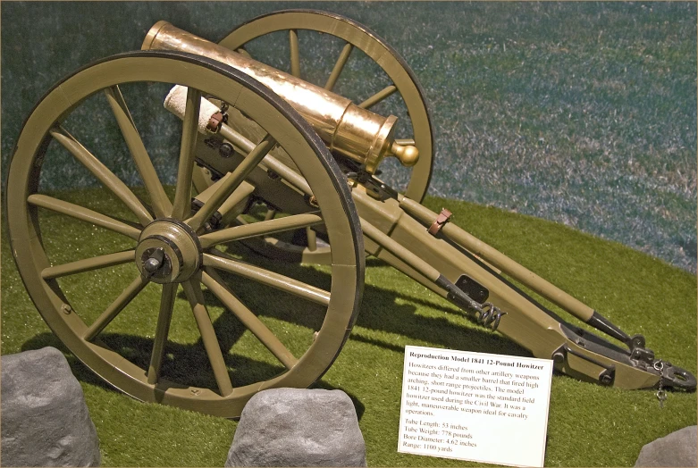 a large wooden cannon with a paper attached