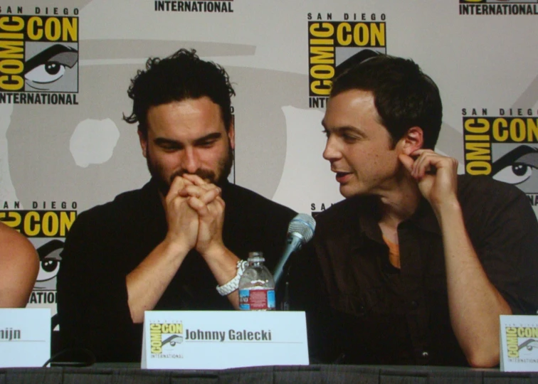 two actors are at a panel for the new moon