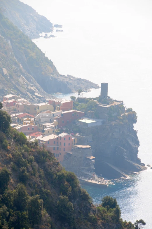 the town is perched on a cliff by the water