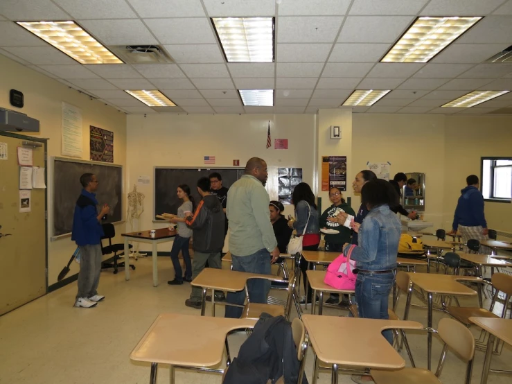 a group of people in a classroom setting