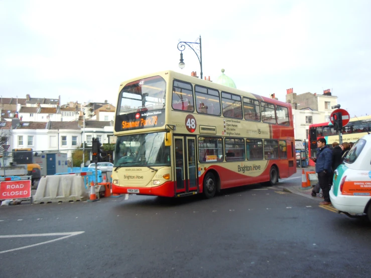 a double decker bus on the side of the road