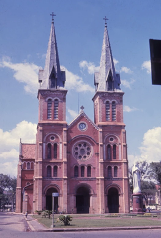 a large cathedral sitting on the side of a road