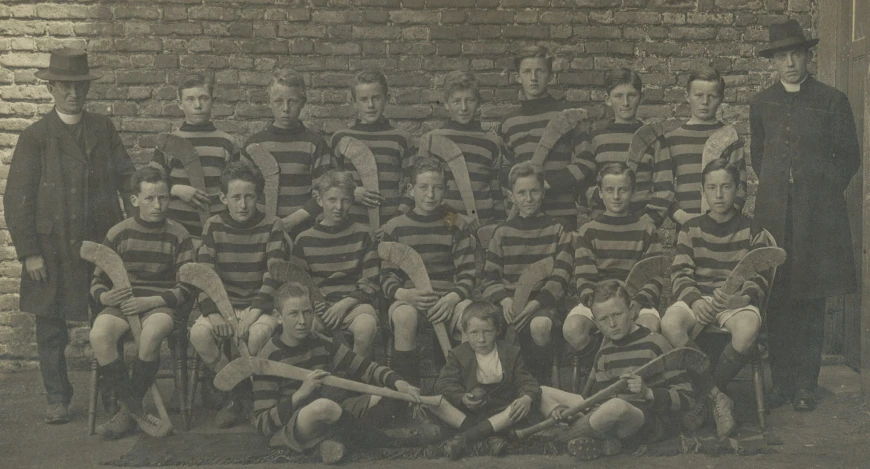 an old po of a soccer team in striped uniforms