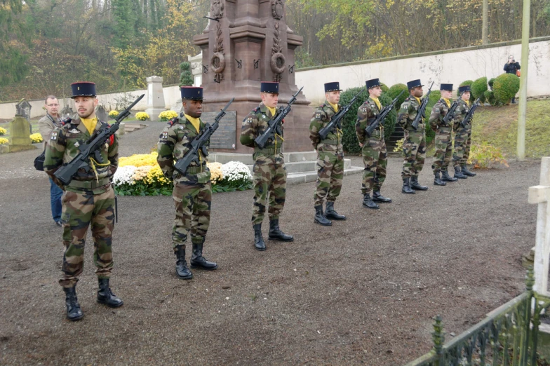 an army band standing around in uniforms