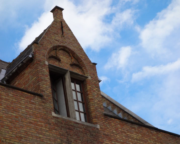 the side view of a red brick building