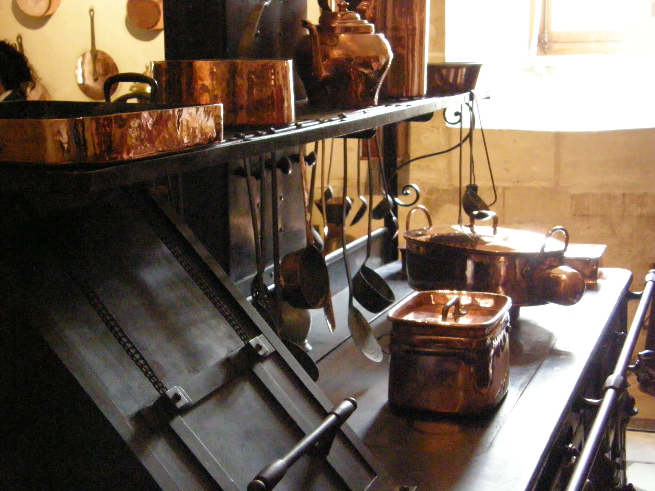 this is a collection of pots and pans sitting on a table