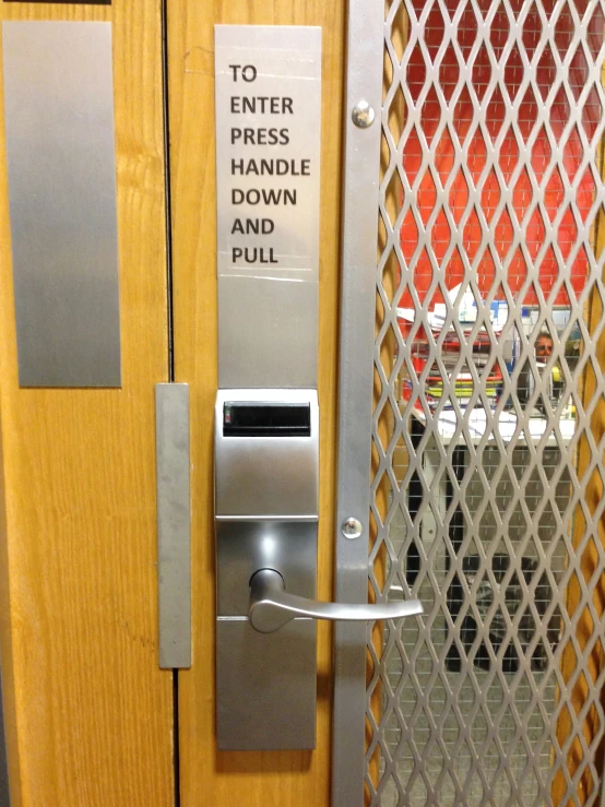 there is an entry to the press handle of a public toilet