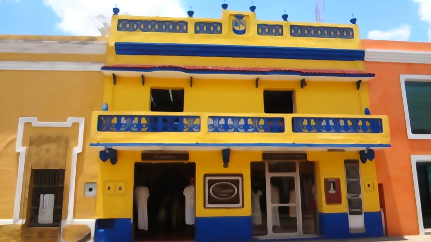 a building has a yellow front with blue and white windows