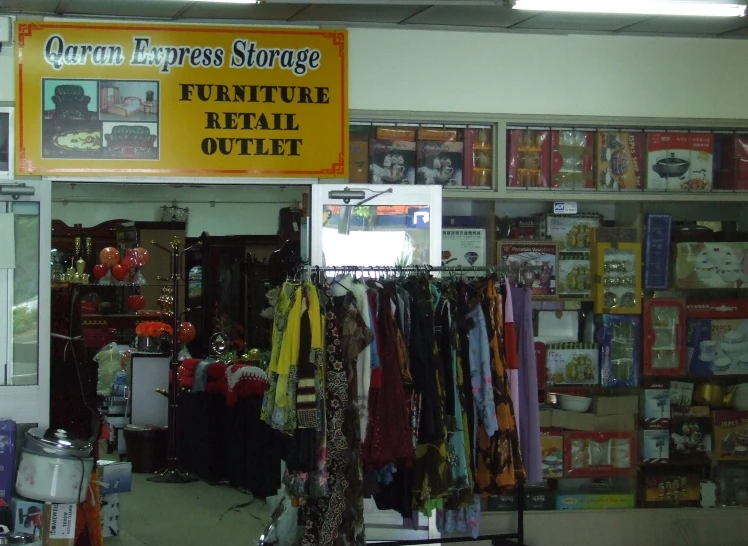 a retail store selling clothes, bags and other items