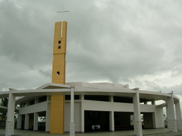 a tall clock tower sitting in front of a building