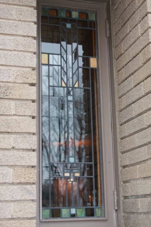 an old window and front door with glass