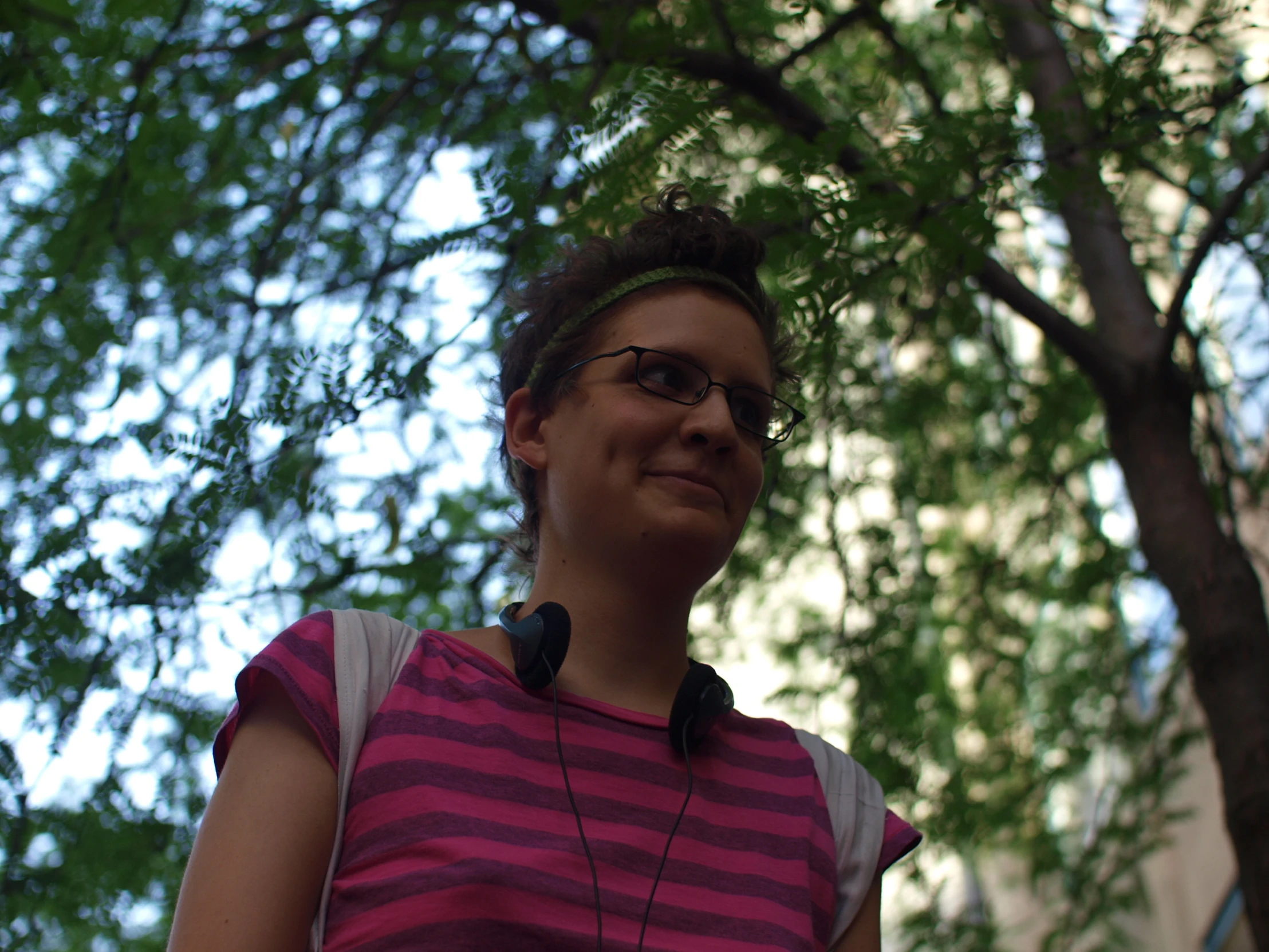 a woman is listening to music on her headphones