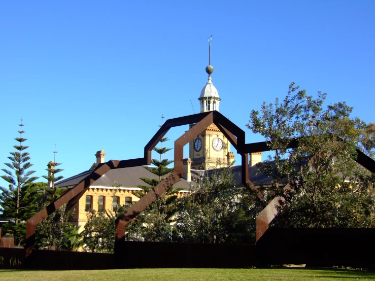 the clock tower of an old style building