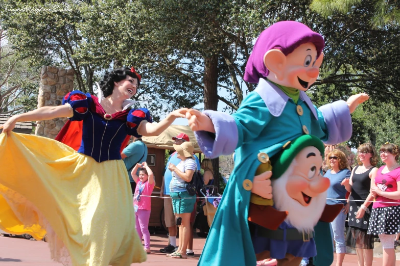 a couple of people are dancing on a stage