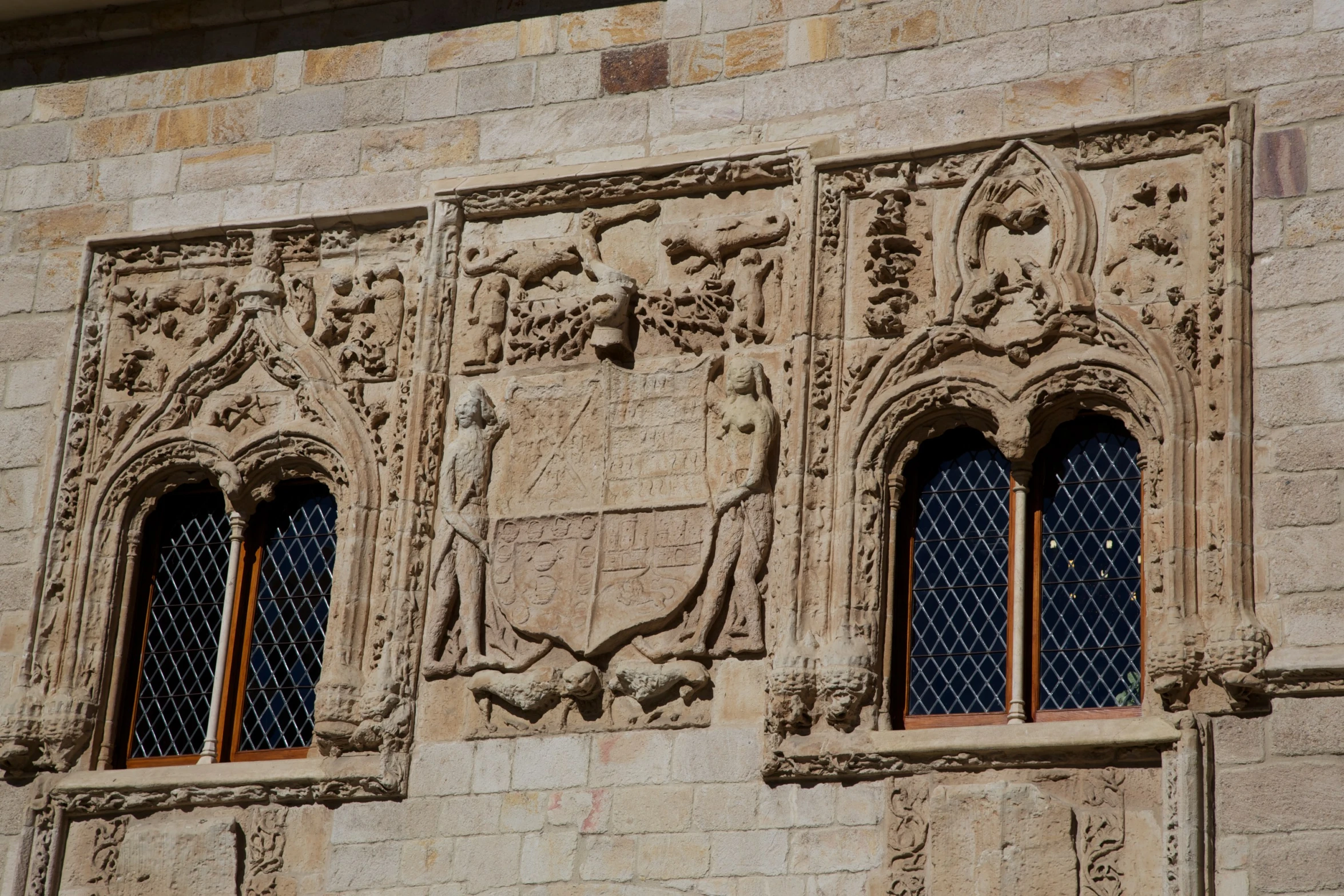 an image of three windows in the side of a building