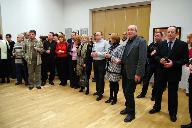 group of people in a waiting room for the event to start