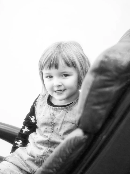 a black and white po of a young child