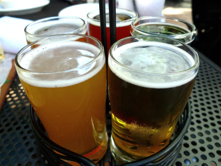 four different kinds of beer are in a basket