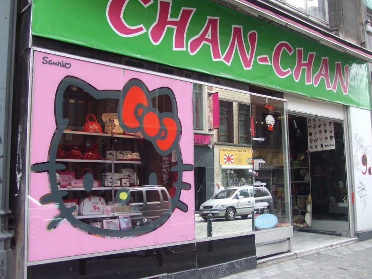 a hello kitty shop in china has hello kitty signs on the windows