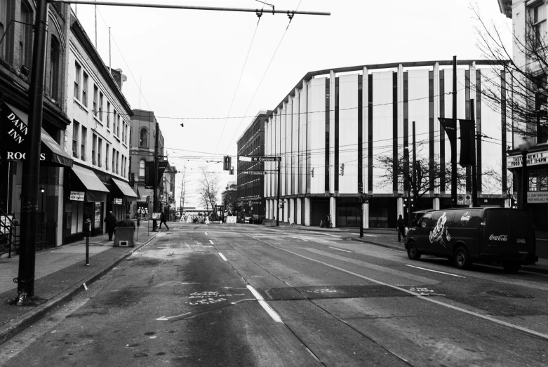 a busy city street lined with tall buildings