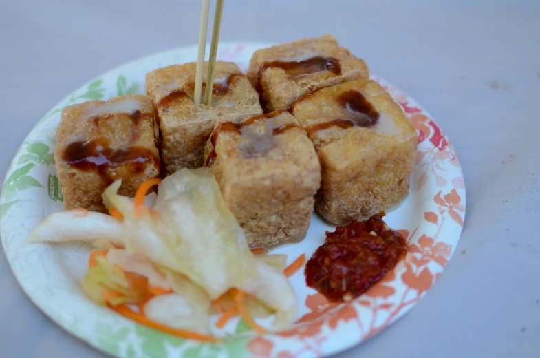 an asian dish is being eaten on the plate