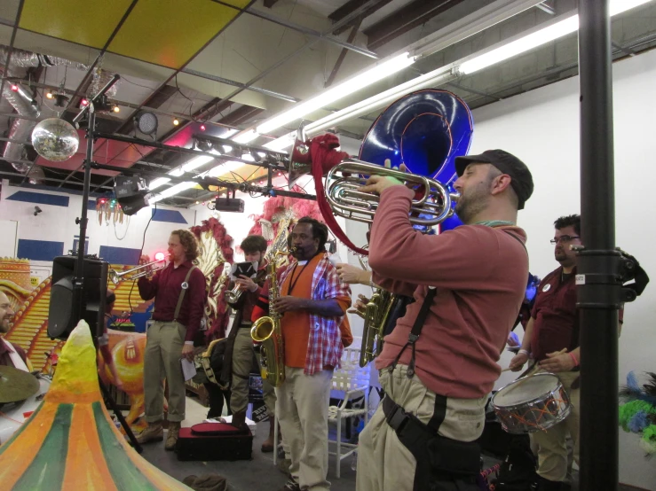 an image of people playing instruments at an event