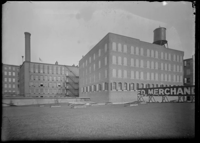 a factory building that has a lot of windows