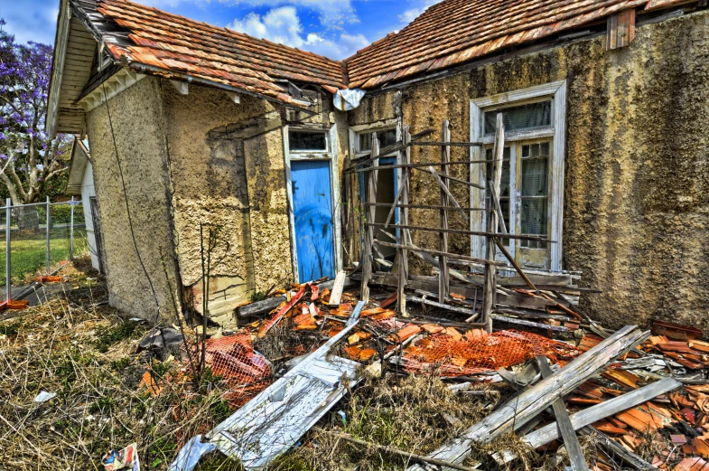 the remains of an old house that needs repair