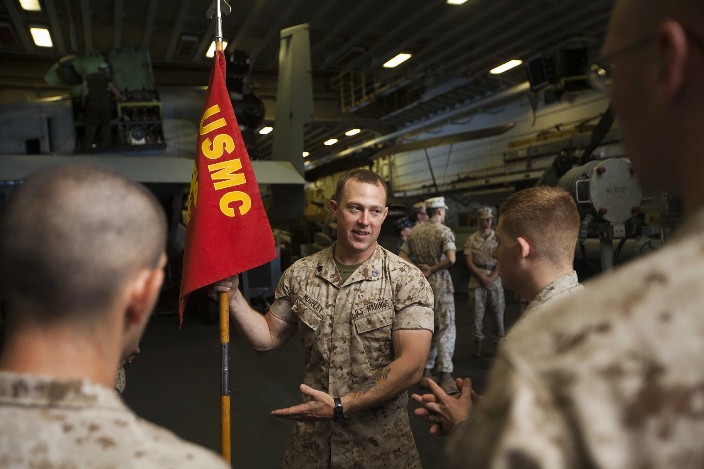 a soldier is talking to his service men