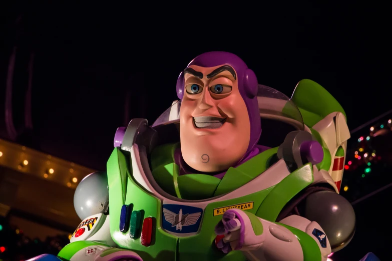 a close up of an inflatable buzz light up buzz toy