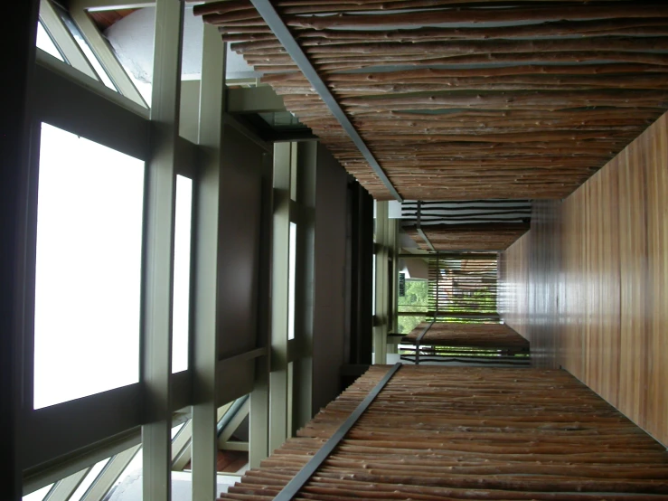 a row of wood floors with multiple windows