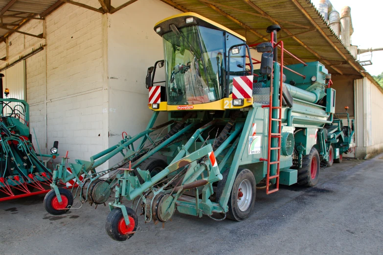 a tractor is shown with some attachments on it