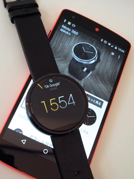 a smartwatch that is connected to a cellphone