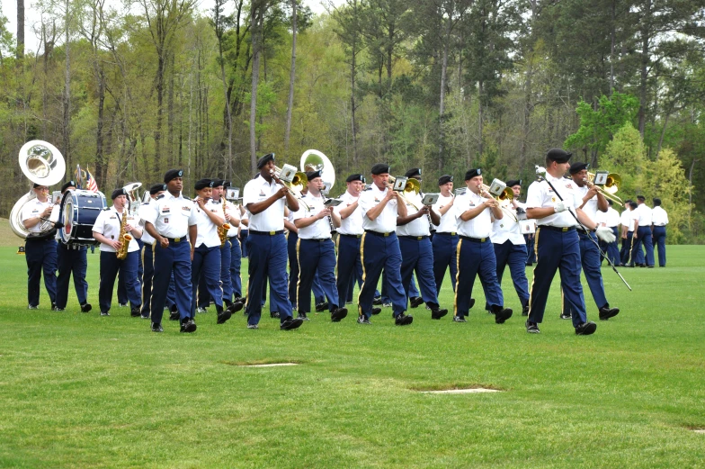 a marching band performs in front of an audience