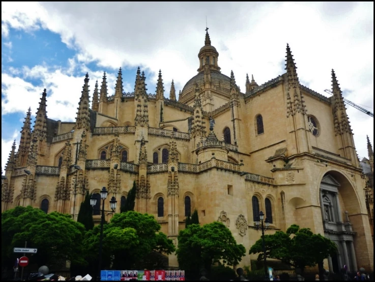 a big tall building with lots of spires on top