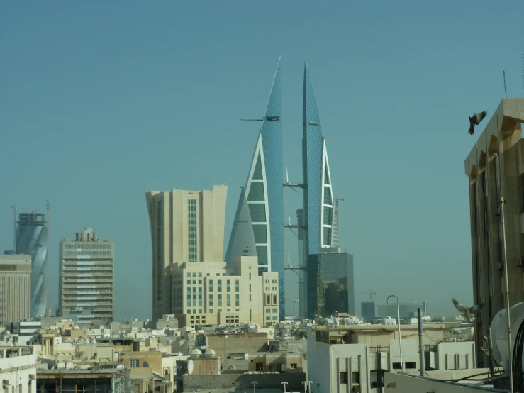 view of buildings and skyscrs in the day