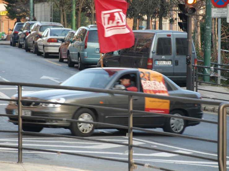 a traffic jam in an urban setting with cars, trucks and people