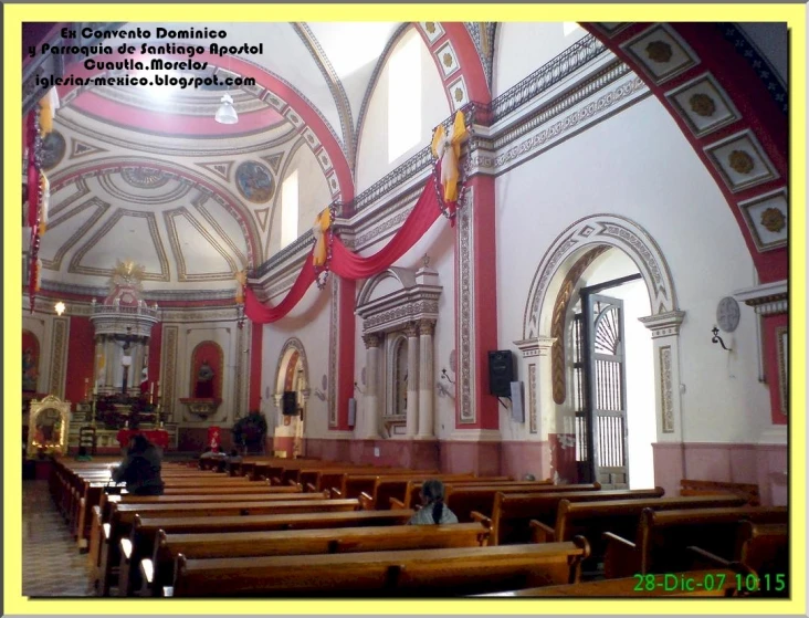 interior po of an old catholic church in an area with arched ceilings