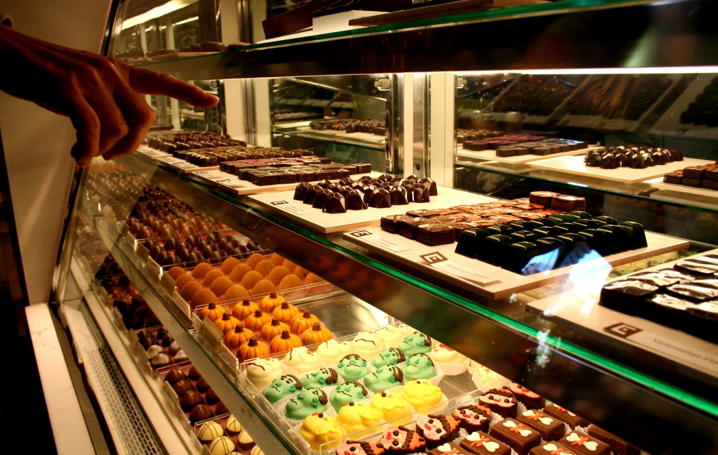 a display case filled with different types of baked items