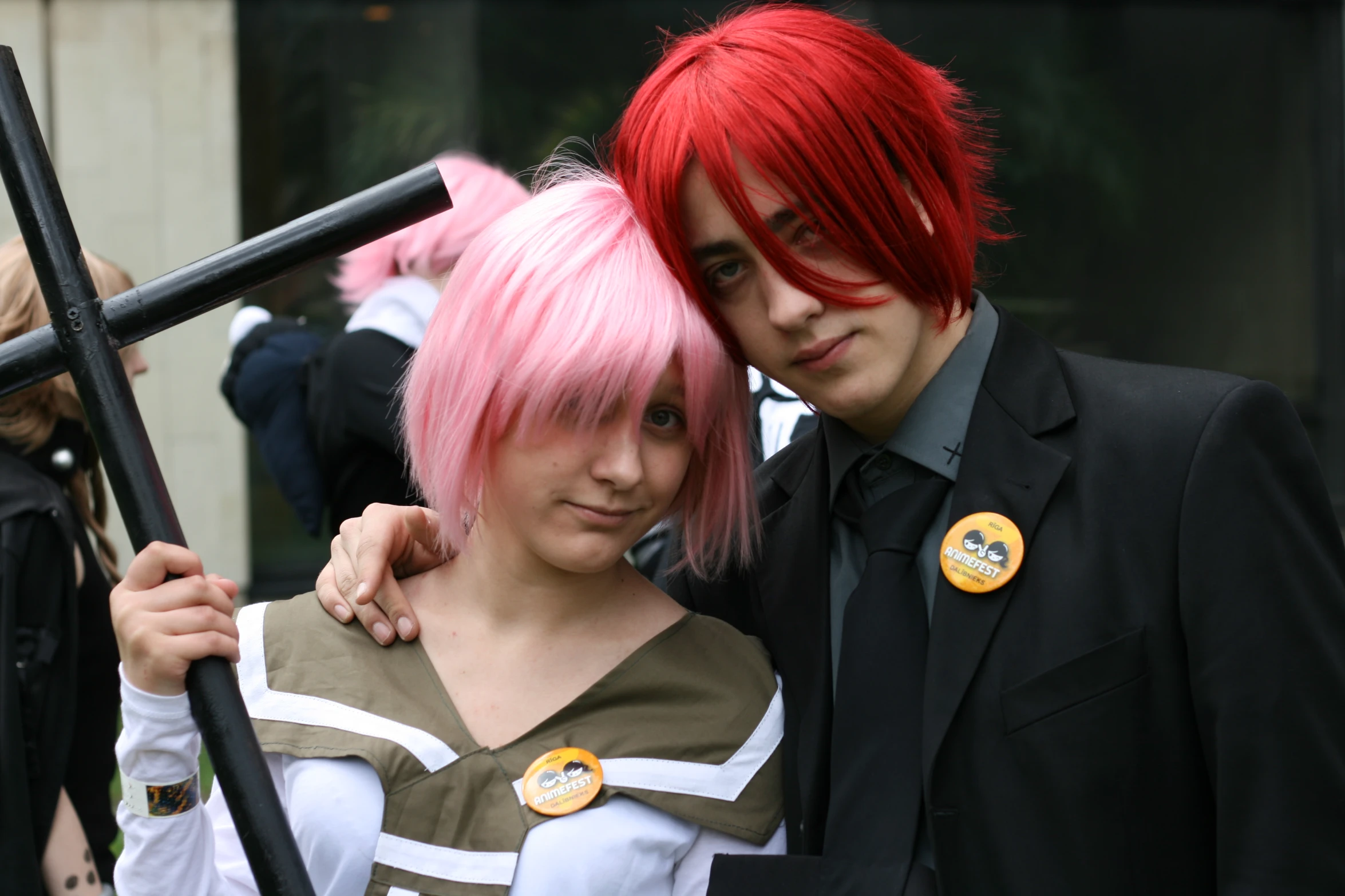 two people in costume are standing side by side