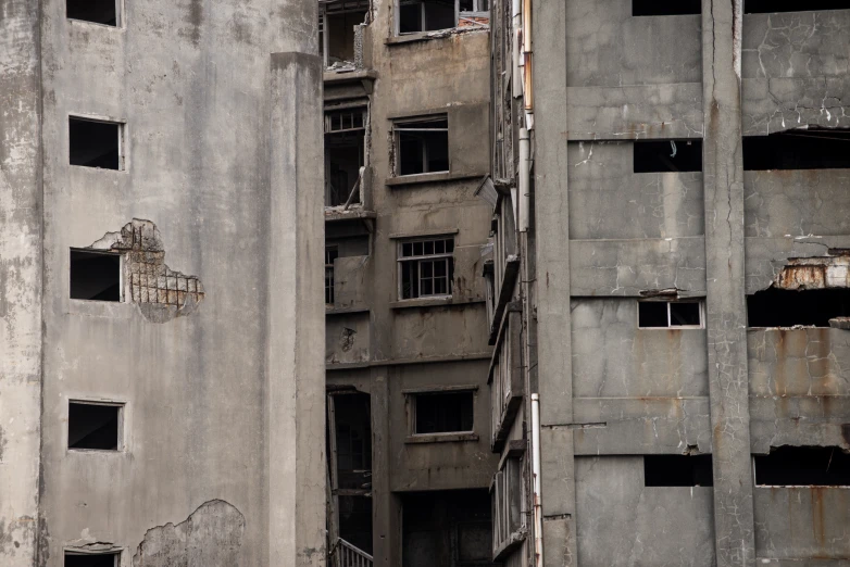 an old run down grey concrete building is featured in this picture