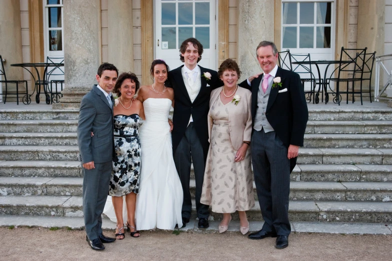 a couple and their friends at a formal event