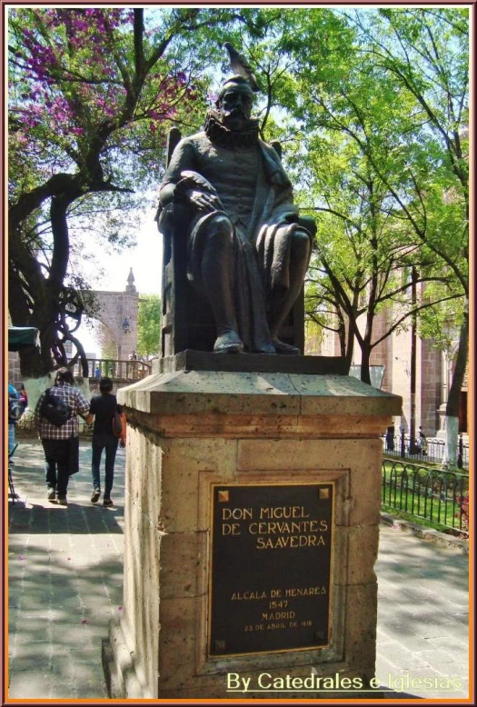 statue with a quote about the life and death of a man