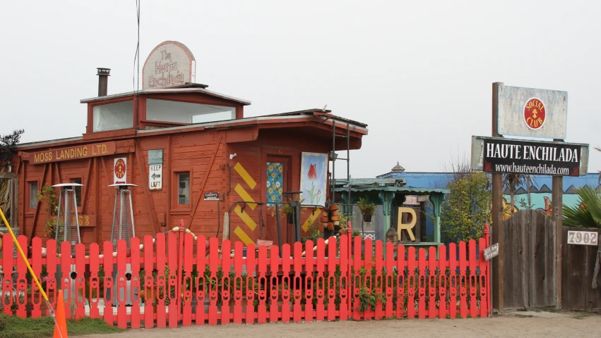 the red brick building has many decorations on it