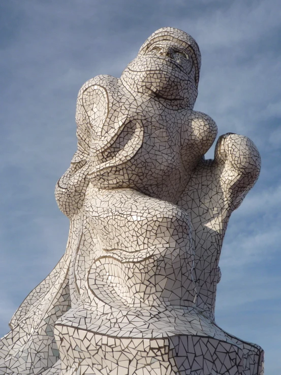 a very close up view of the very large statue