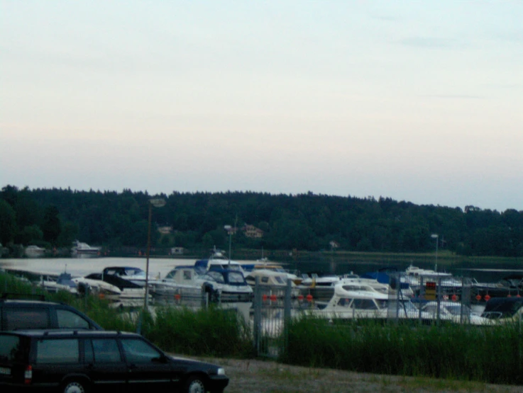 there are many different types of boats docked at the marina