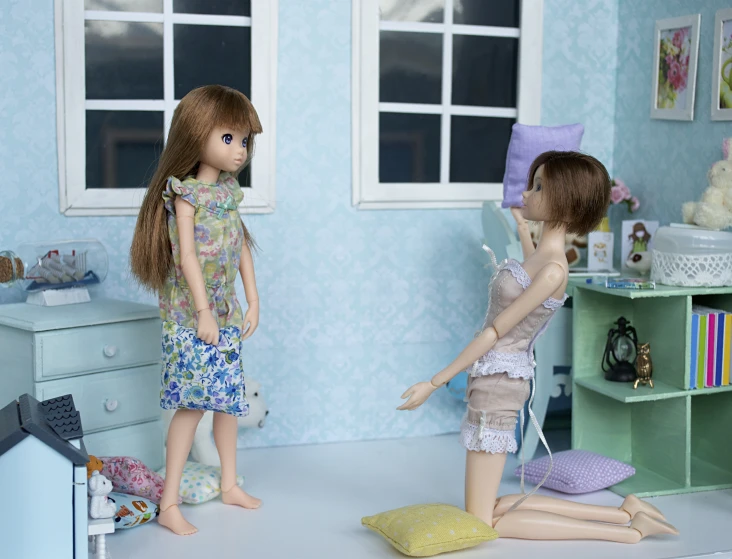 a girl's bedroom scene with two doll in it