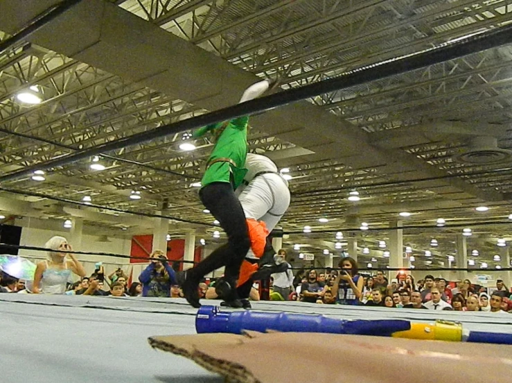 a man riding a skateboard inside a warehouse